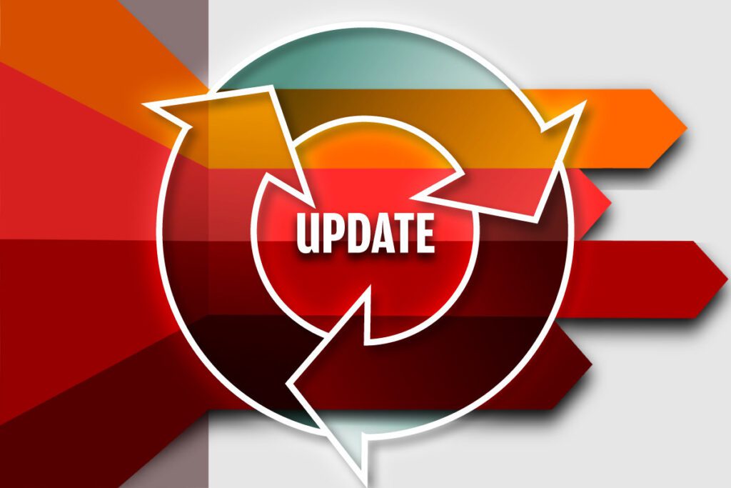 A red, orange and green circle with the word update in it.